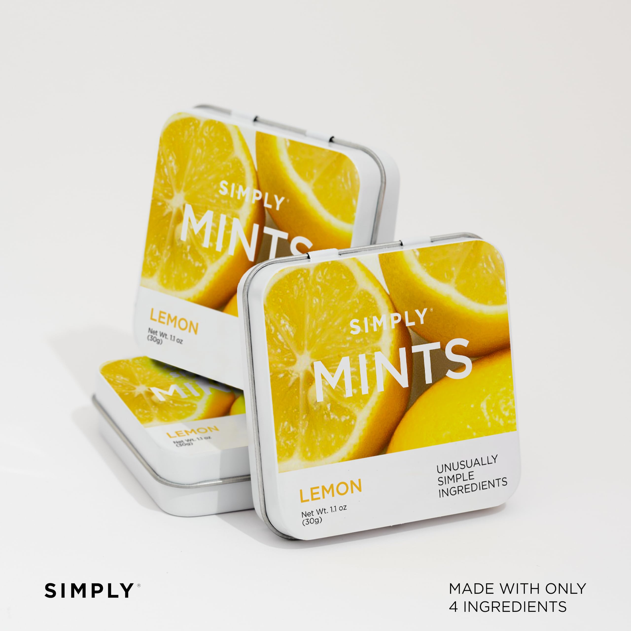 Simply Gum latas apiladas ilustrando envase metálico reutilizable
