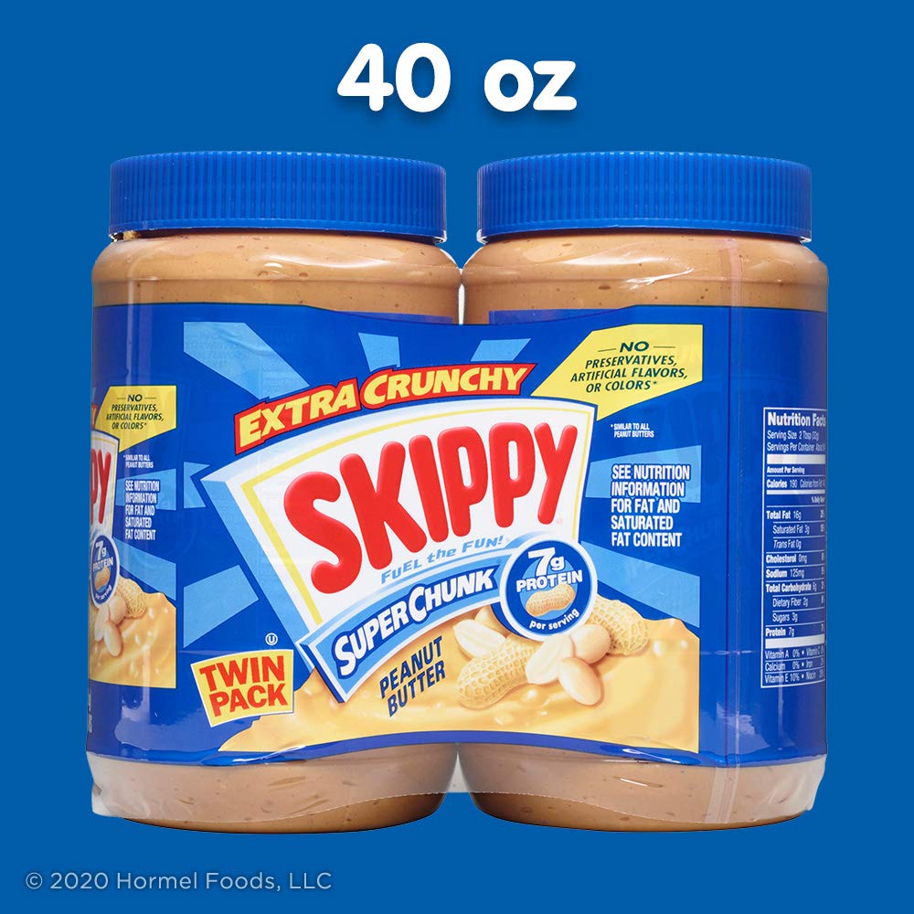 SKIPPY frasco en mano para mostrar tamaño y porciones útiles