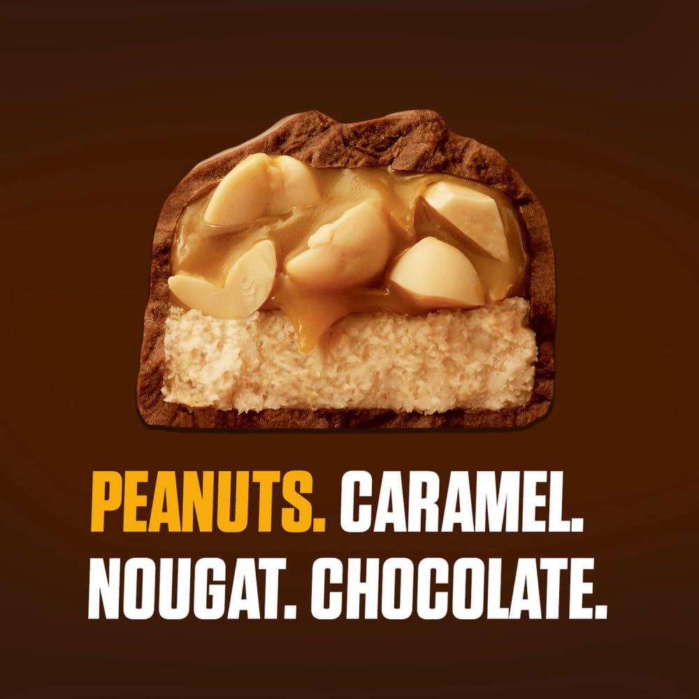 SNICKERS caramelo estirado destacando la capa pegajosa y sabor dulce