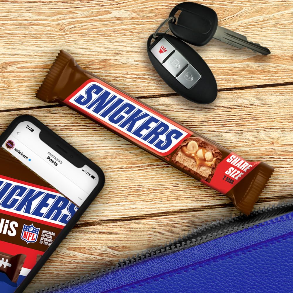 Snickers mesa de fiesta con barras mostrando uso en candy buffet y regalos