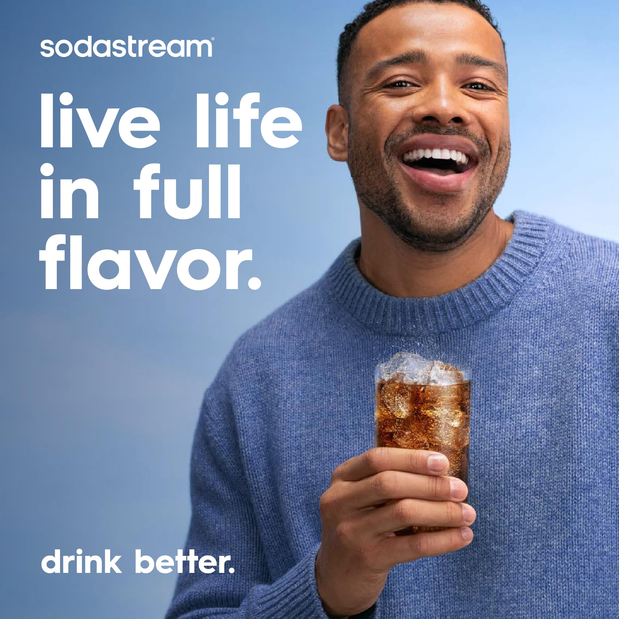 sodastream botellas alineadas en mesa listas para uso doméstico