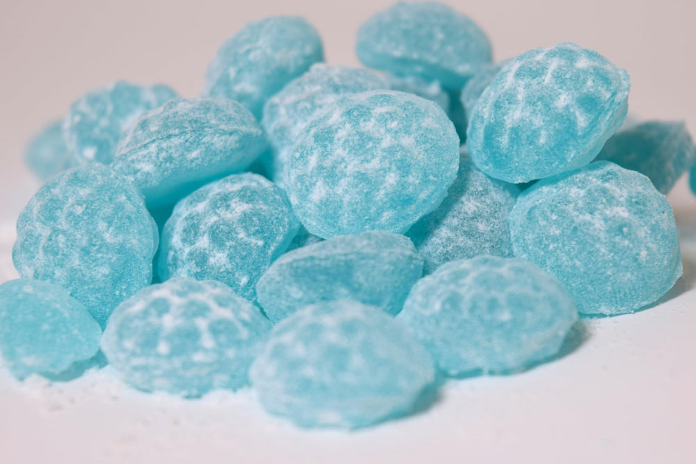 Sour Drops primer plano de textura y centro dulce visible