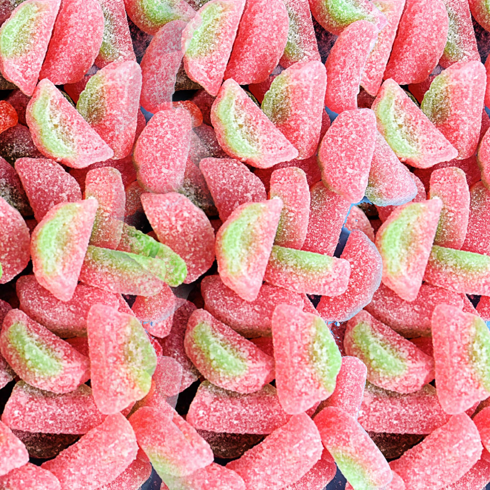 SOUR PATCH KIDS junto a una moneda para comparar tamaño real