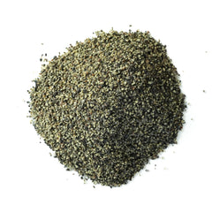 Spiceology en cocina en acción molida sobre tabla resaltando uso en recetas
