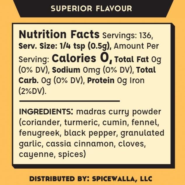 SPICEWALLA uso en sartén salteando verduras con Madras Curry realzando sabor