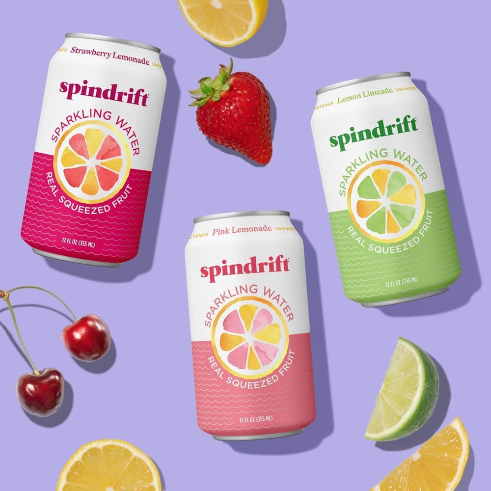 Todas las latas Spindrift dispuestas sobre una mesa mostrando diversidad de sabores