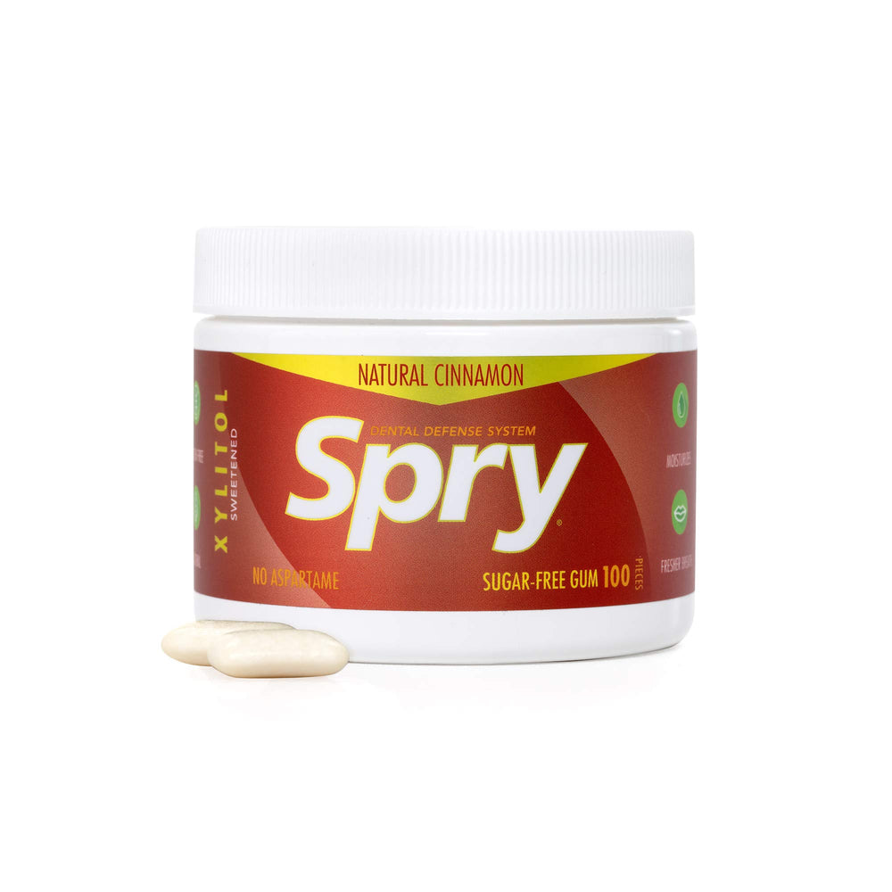 Spry chicle canela junto a objetos cotidianos para comparar tamaño portátil