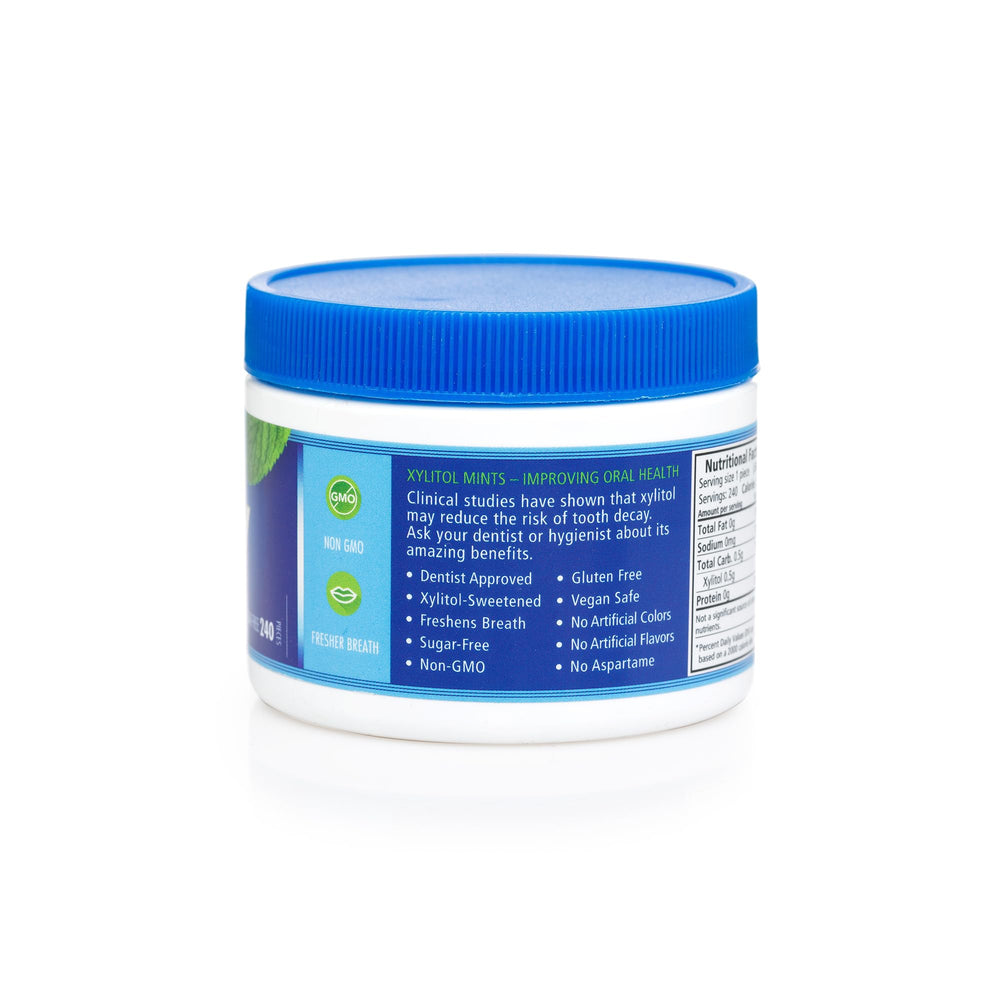 Spry menta comparación de tamaño junto a una moneda, idea de porción