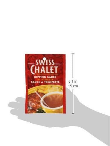 Cuenco de salsa Swiss Chalet junto a alitas doradas indicando maridaje ideal