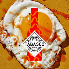 TABASCO junto a vasos para comparar escala y rendimiento por porción