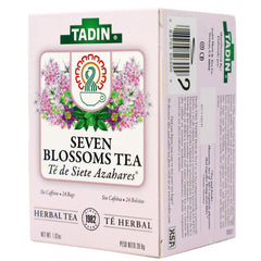 Tadin Seven Blossoms taza humeante en mano, transmite calidez y pausa reconfortante