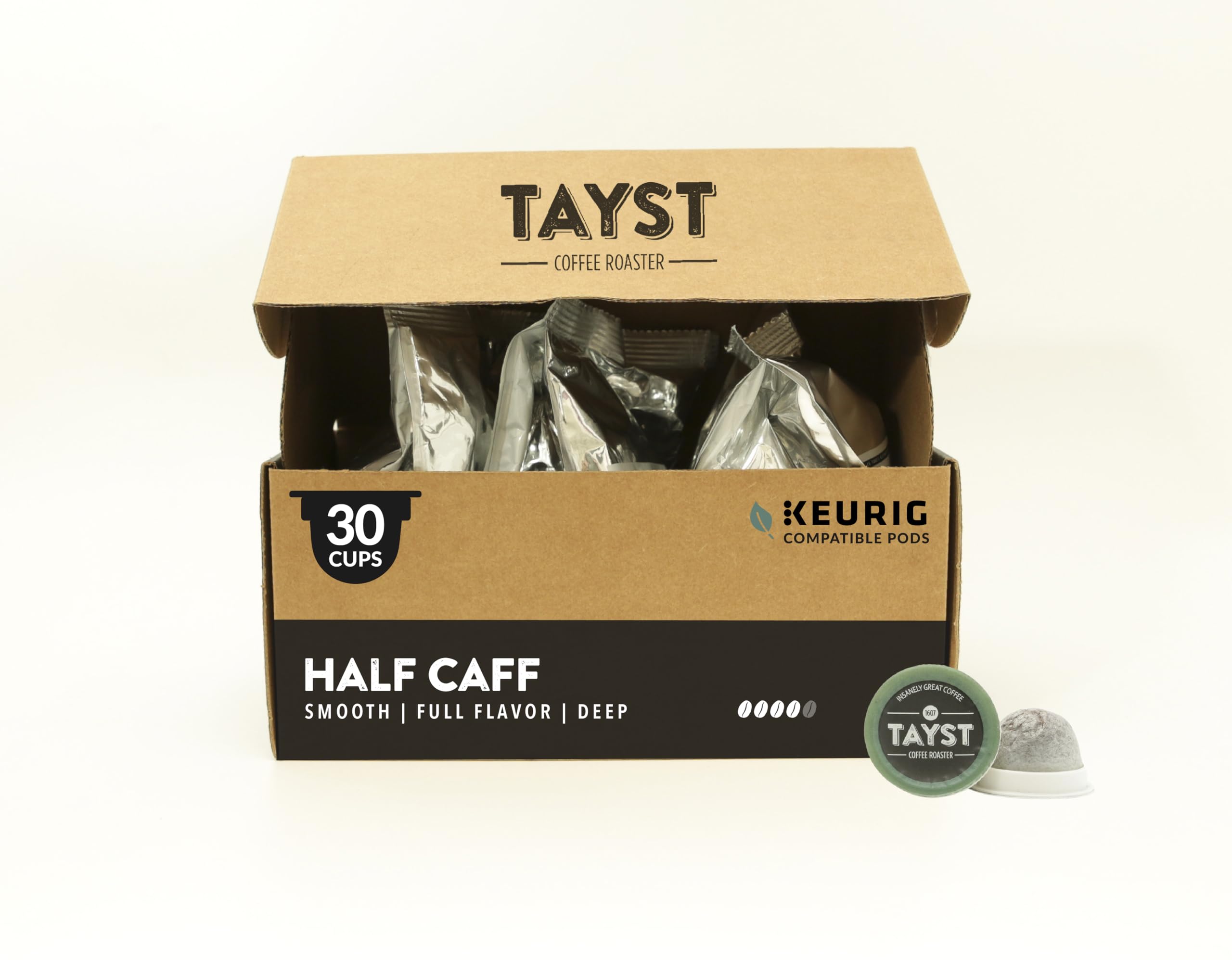 Tayst cápsula K-Cup frontal mostrando diseño compostable y sabor intenso