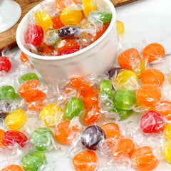 THE HAMPTON CANDY COMPANY comparación de tamaño del disco en mano