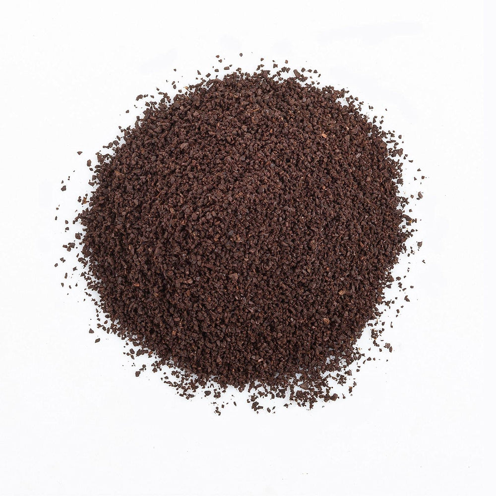 The Organic Coffee Co. cápsula insertada en cafetera K‑Cup, extracción consistente