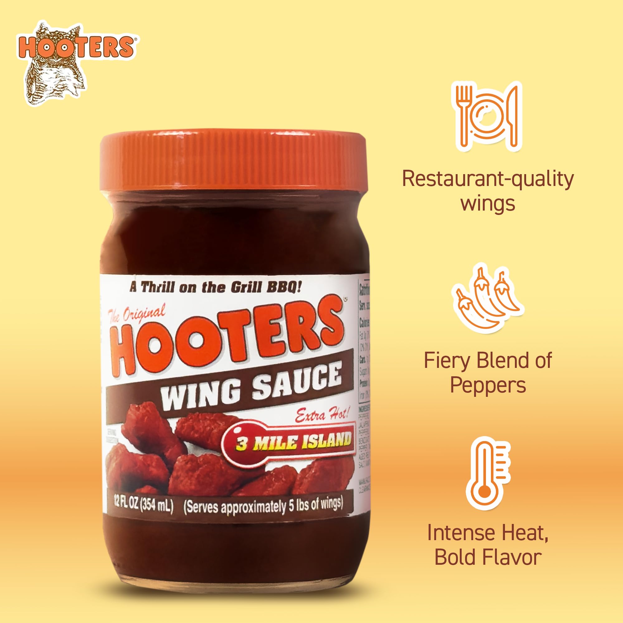 The Original Hooters aplicación en parrilla sobre costillas demostrando glaseado brillante