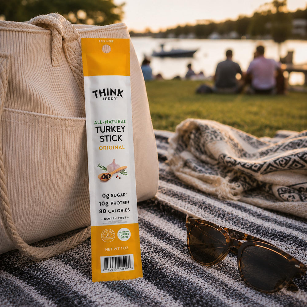 Think Jerky bastón en mano para comparar tamaño real y control de porción