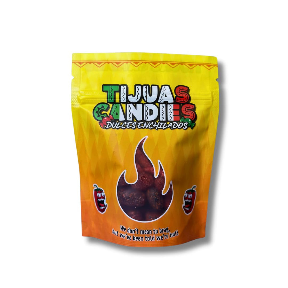 Tijuas Candies comparación de tamaño en mano para evaluar porciones y consumo