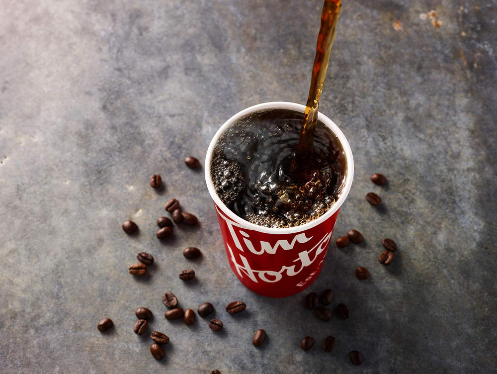 Tim Hortons etiqueta que indica 100% Arábica y origen claro