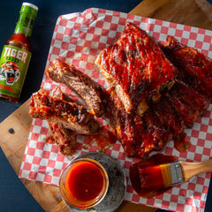 Try Me Tiger Sauce junto a regla para comparar tamaño 5oz, práctico para cocina
