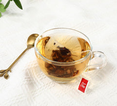 ULTHMOK bolsita piramidal abierta mostrando hojas, extracción eficiente y aroma