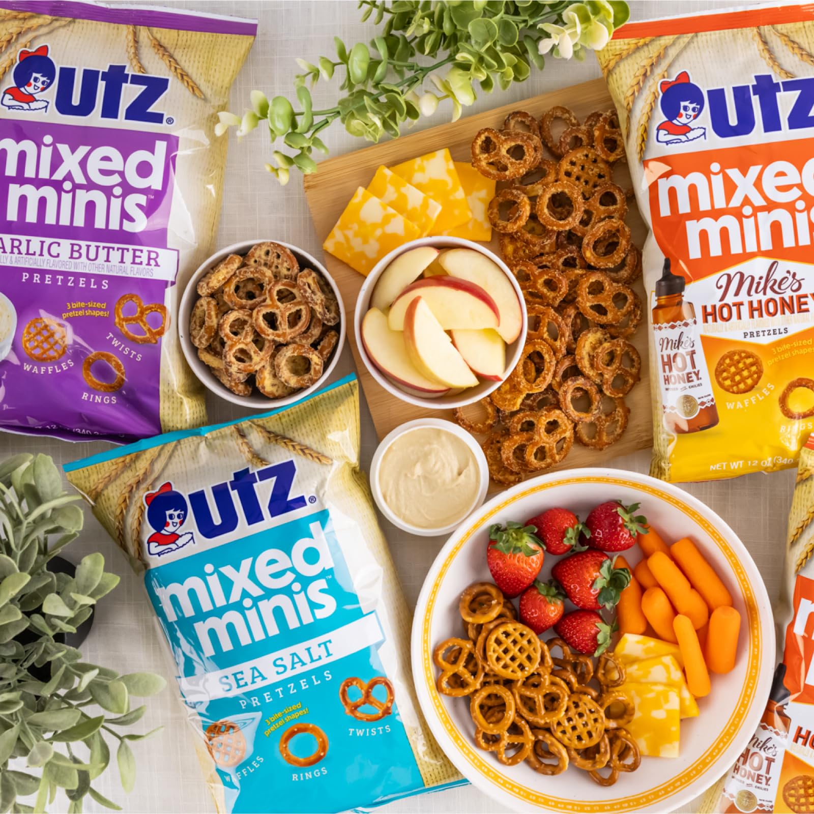 Mesa de fiesta con Utz para ilustrar variedad y facilidad para compartir