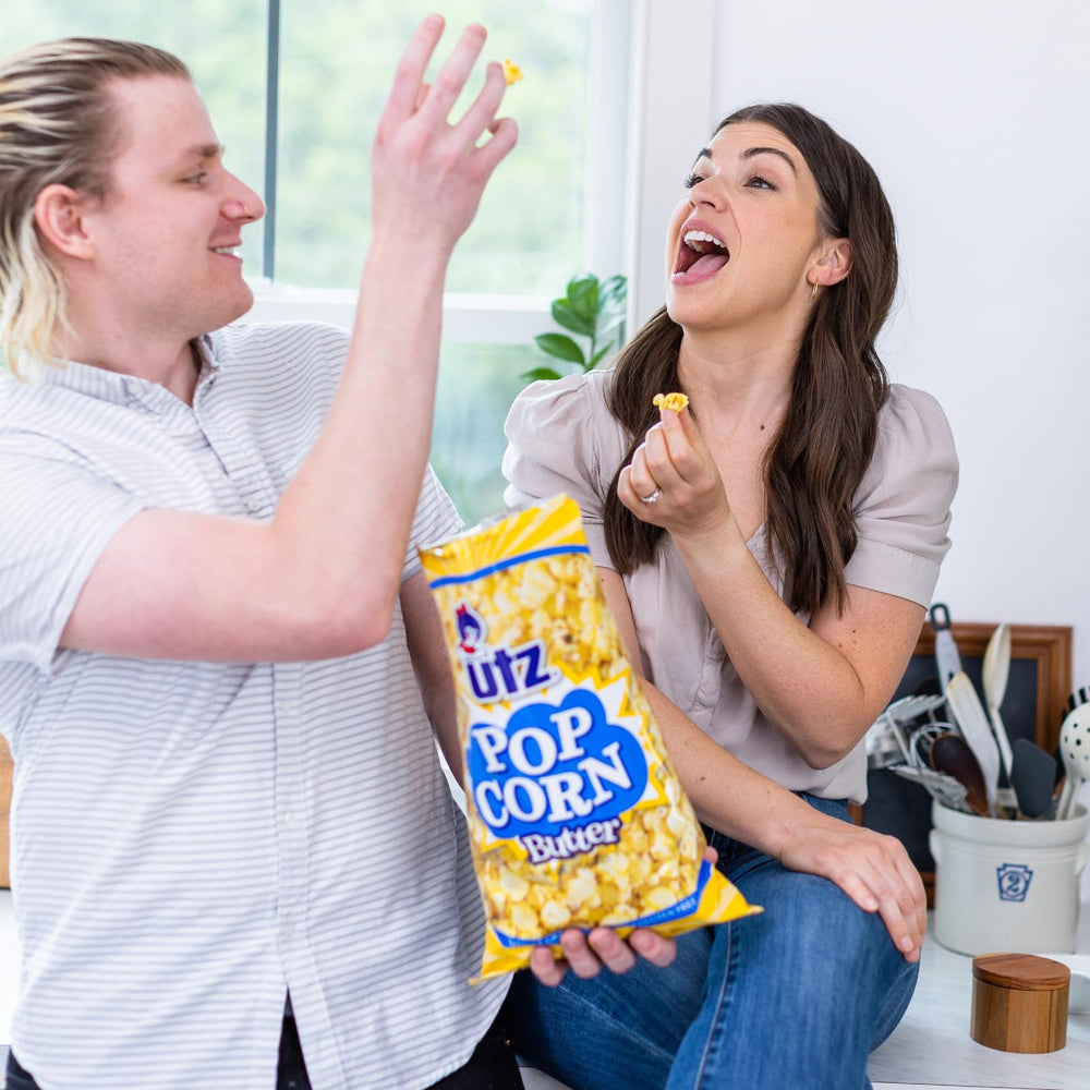 Utz bolsa en mano mostrando tamaño porción y control de ración