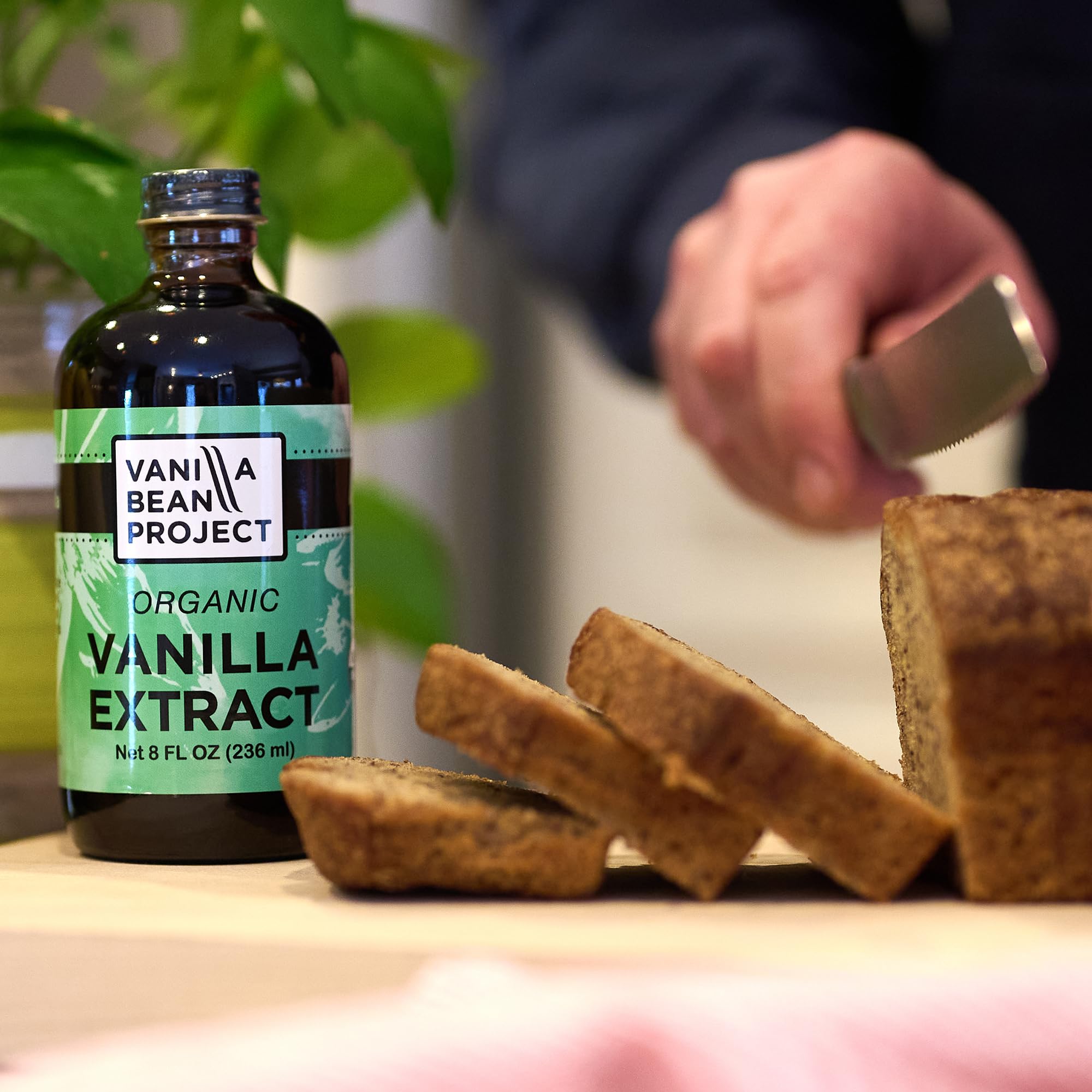 VANILLA BEAN PROJECT vainas apiladas que muestran origen auténtico