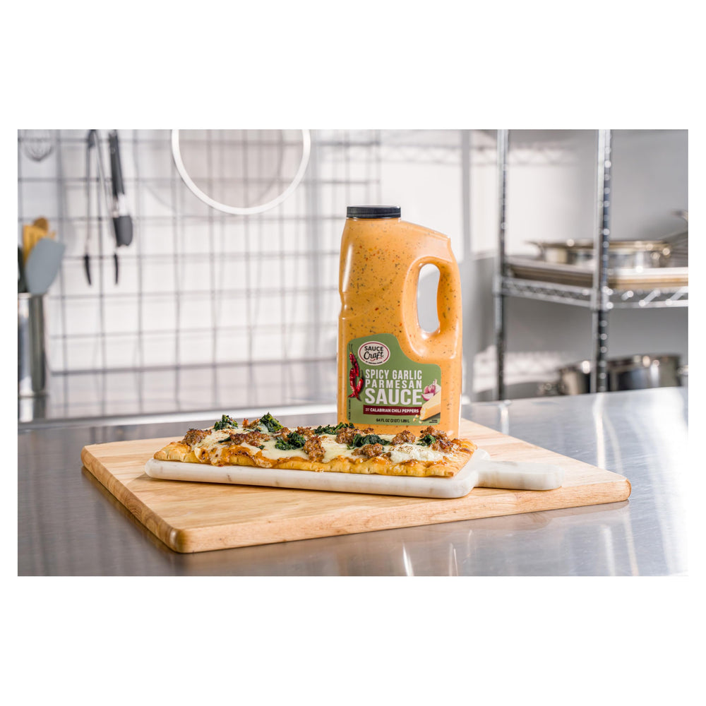 Ventura Foods salsa cubriendo alitas, realza sabor y apariencia