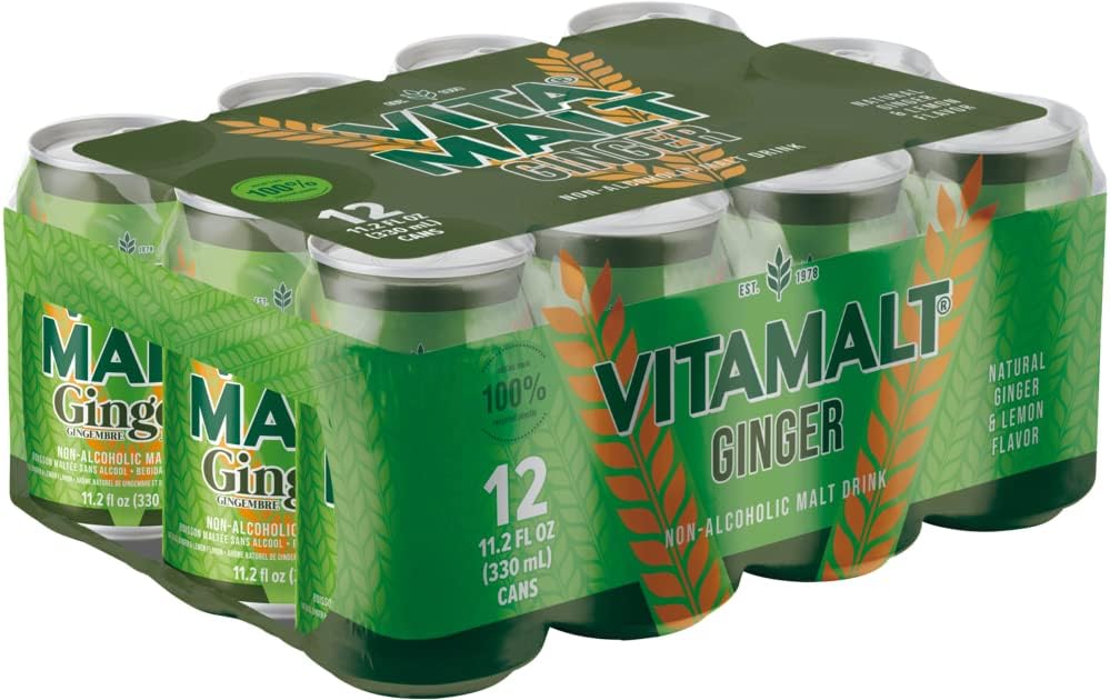 Vitamalt lata abierta con espuma mostrando frescura y carbonatación