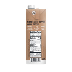 Wandering Bear botella 32 oz junto a una regla indica tamaño práctico