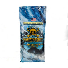 Warpath Coffee primer plano del café molido, textura oscura y aspecto consistente