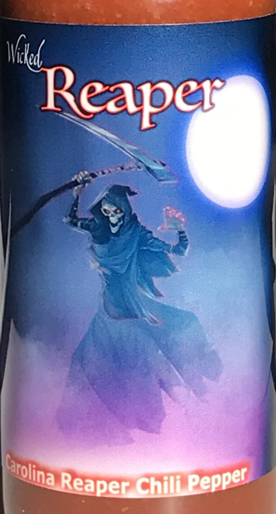 Wicked Reaper botella en cocina junto a ingredientes para inspirar uso