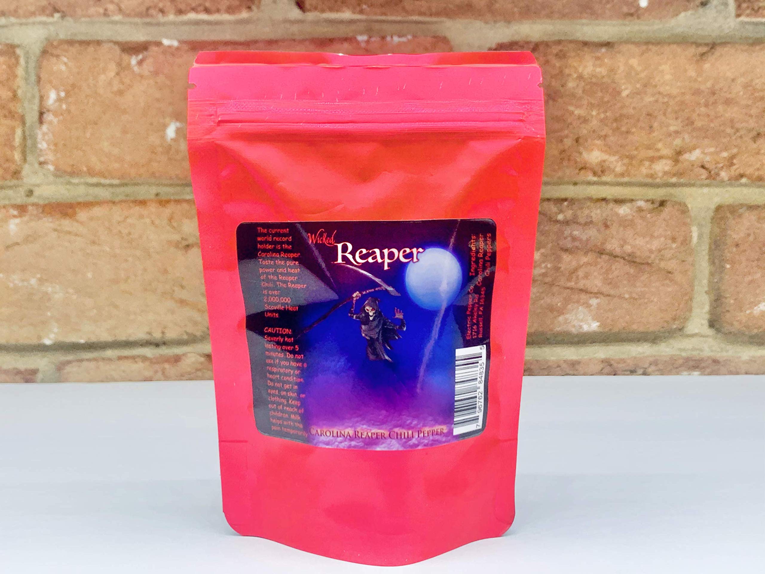 Wicked Tickle Carolina Reaper conjunto de vainas, subraya su fama y potencia extrema