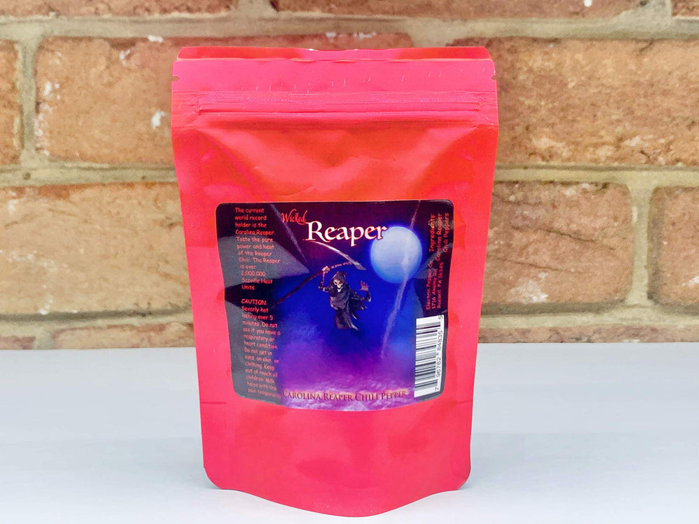 Wicked Tickle Carolina Reaper conjunto de vainas, subraya su fama y potencia extrema