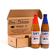 Zab's pack frontal mostrando botellas y diseño, aporta sabor distintivo