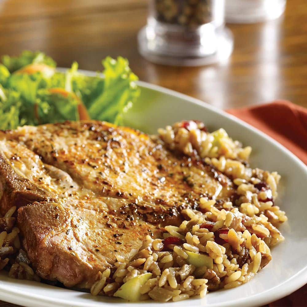 Zatarain's plato de pilaf en mesa familiar mostrando servicio versátil